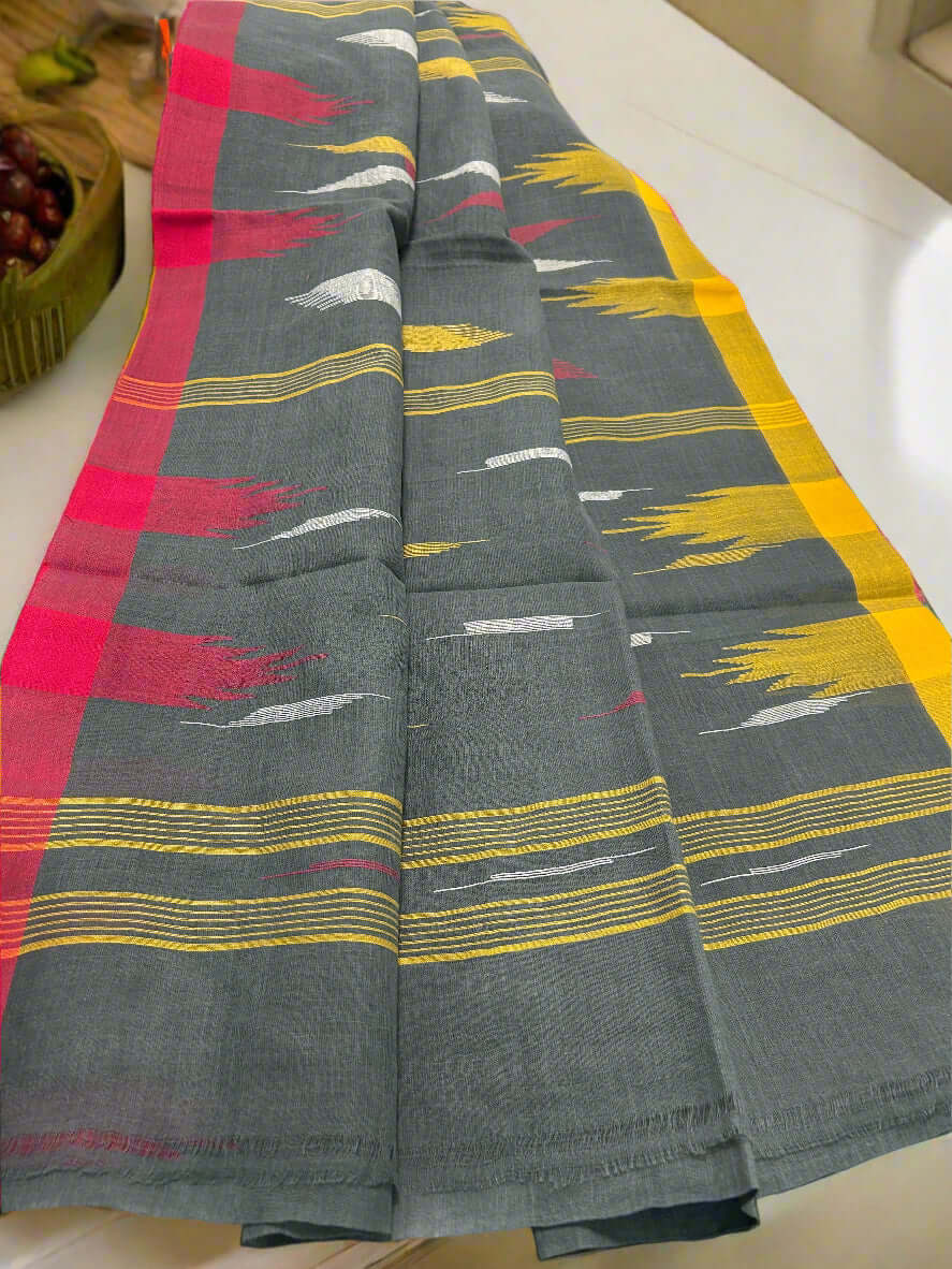 Charcoal Grey Manipuri Handloom Saree with Red and Yellow Accents@Auxerra