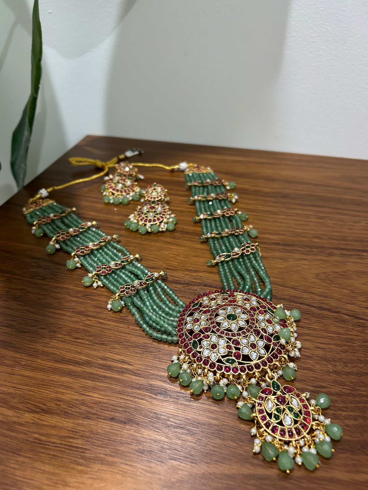 Grand Emerald Beaded Kundan Necklace with Ruby Accents | Auxerra