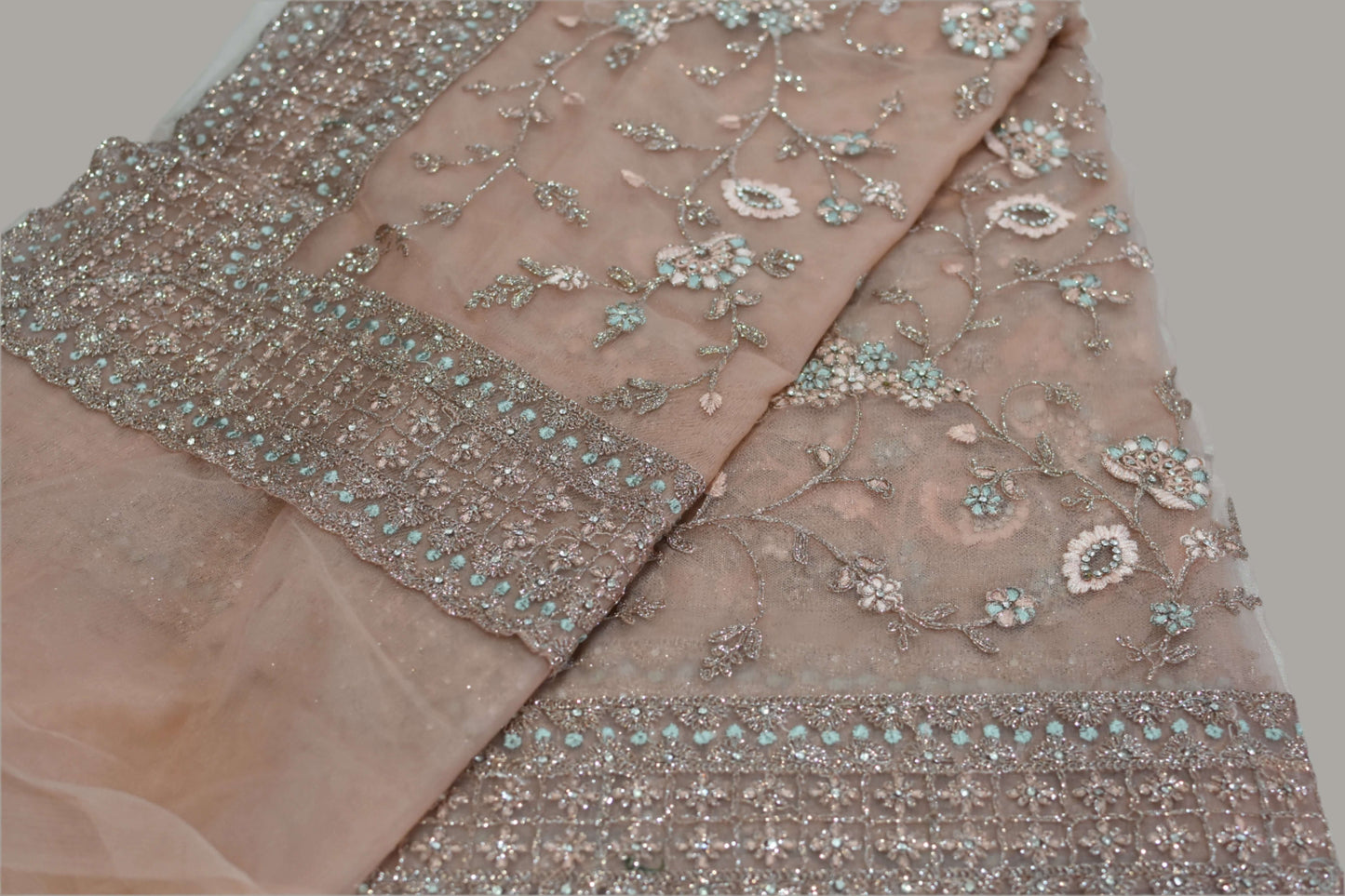Dusty Peach Net Embroidered Saree@Auxerra