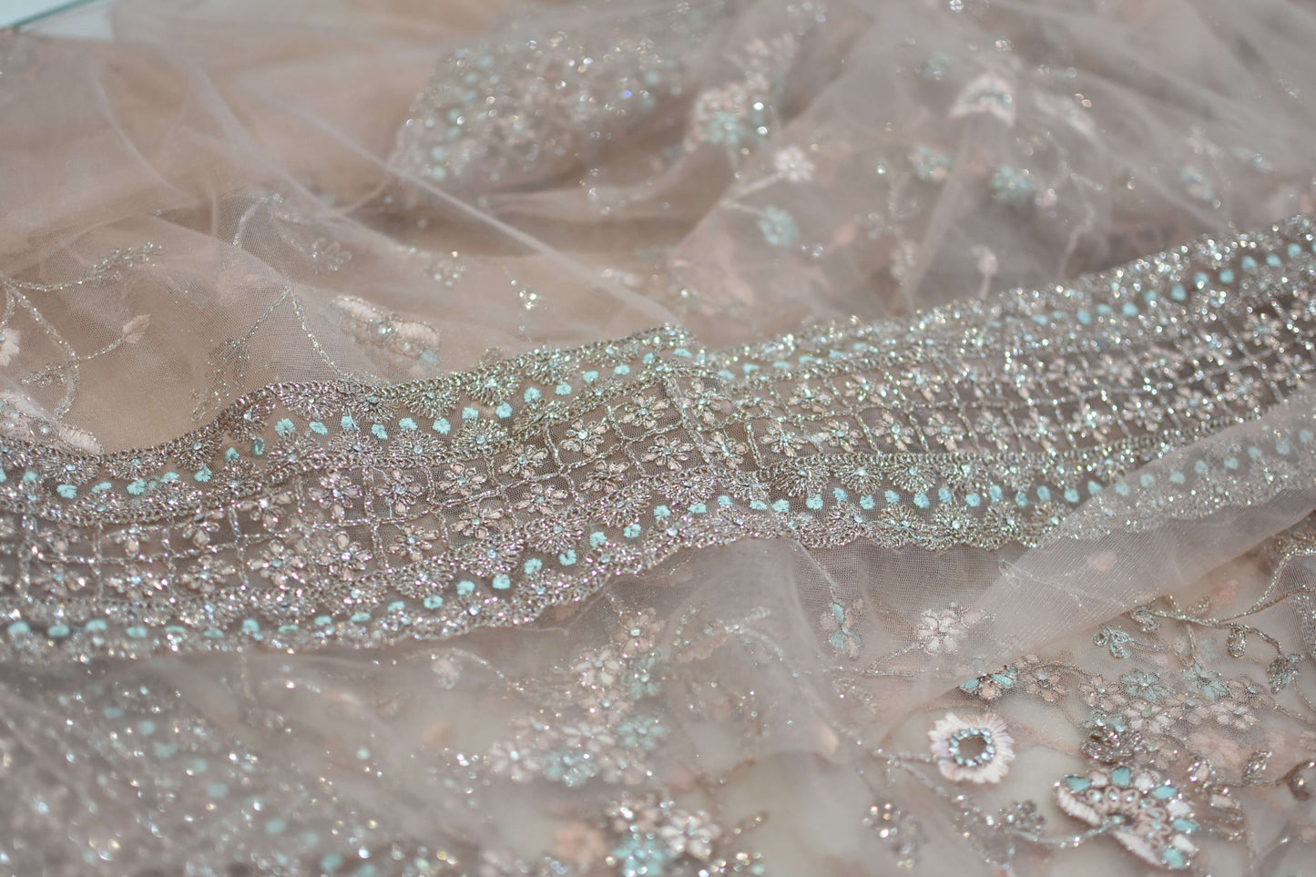 Dusty Peach Net Embroidered Saree@Auxerra