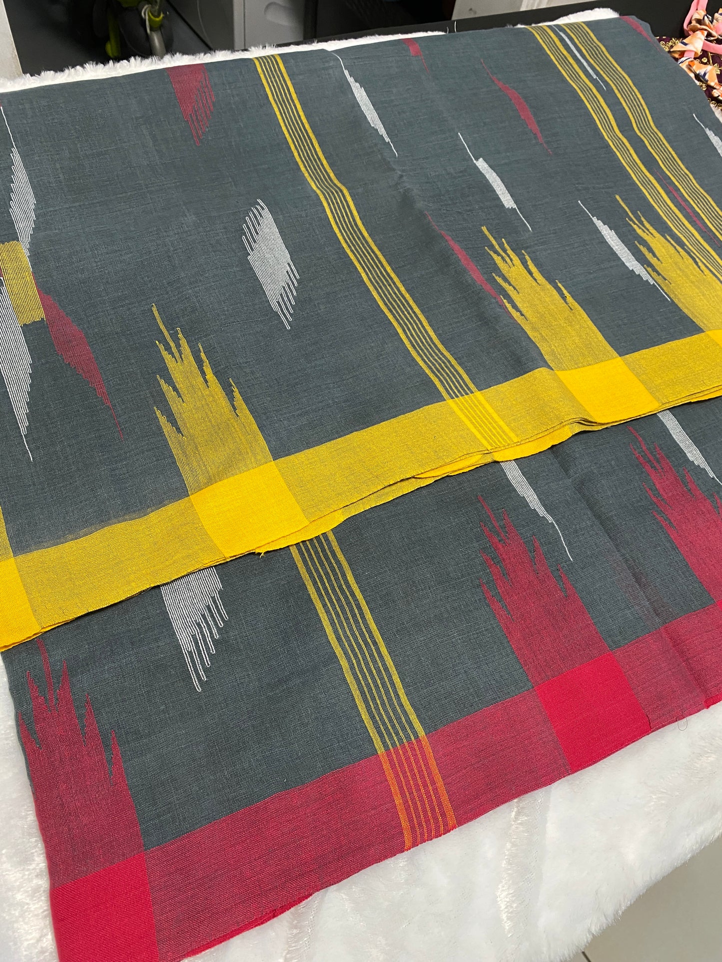 Charcoal Grey Manipuri Handloom Saree with Red and Yellow Accents