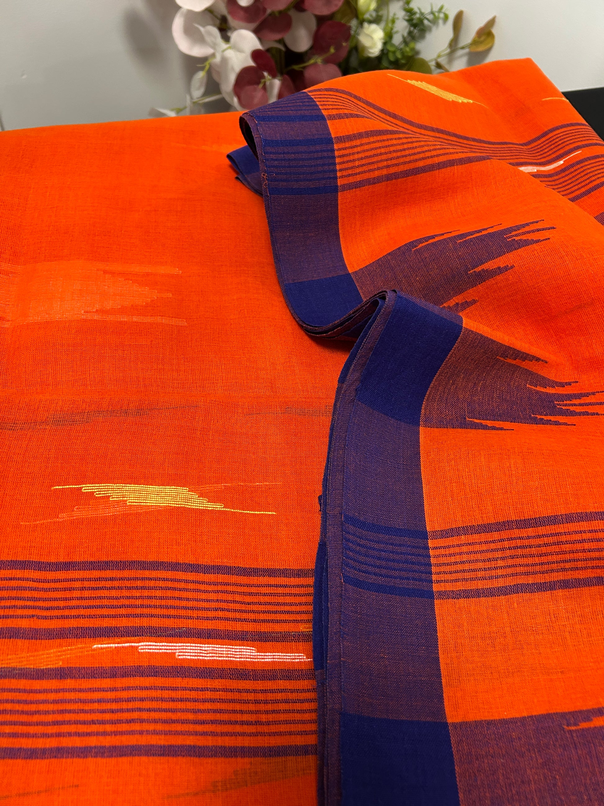 Fiery Orange Manipuri Handloom Saree with Deep Blue Border