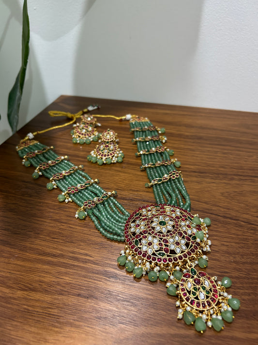 Grand Emerald Beaded Kundan Necklace with Ruby Accents | Auxerra