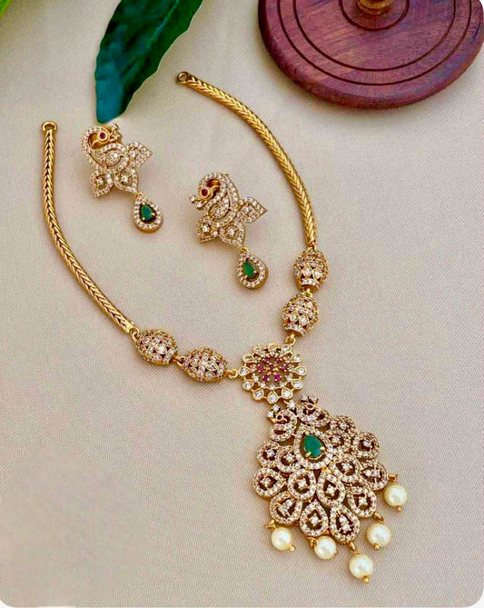 Elegant Gold & Emerald Necklace with Pearl Drops | Auxerra